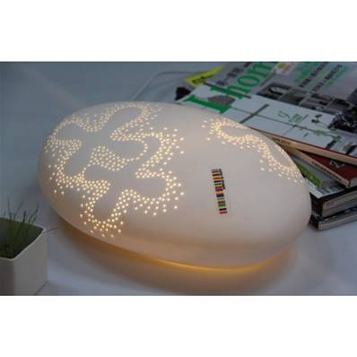 Lampe en porcelaine design en forme de galet avec points lumineux